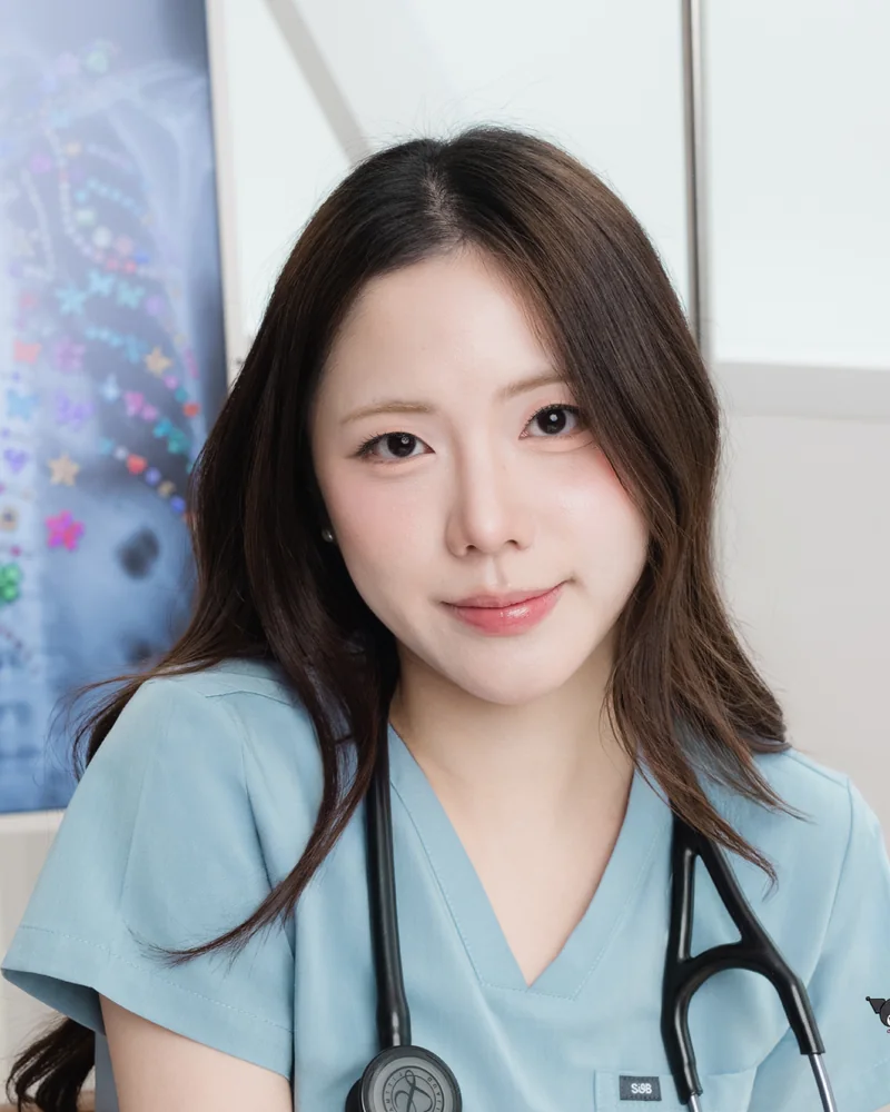 Kuromi Medical Scrub in Bubble Blue, worn