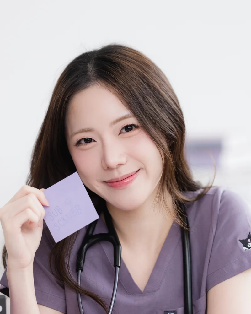 Kuromi Medical Scrub in Grape Mood, worn