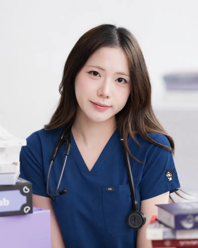 Kuromi Medical Scrub in Navy Chill, styled