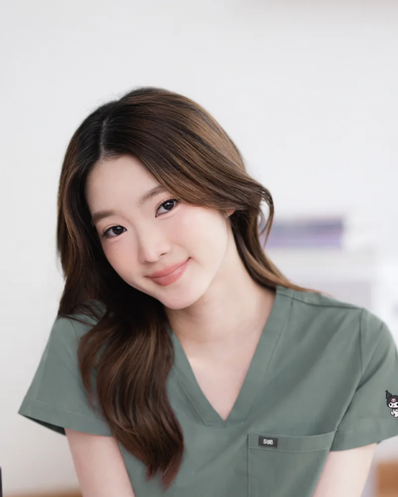 Kuromi Medical Scrub in Pure Matcha, worn