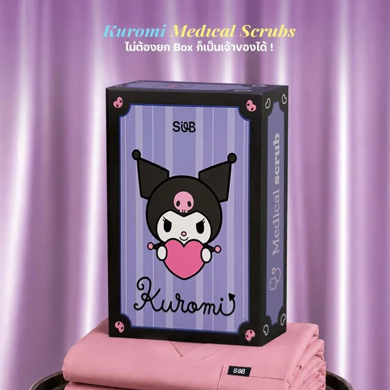 The Kuromi Medical Scrub box on a tray with folded scrubs